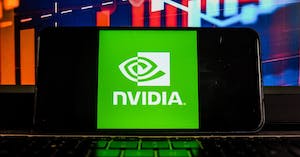 In this photo illustration a NVidia logo is seen displayed