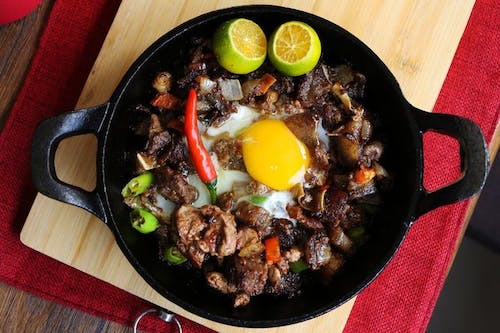 Spicy,And,Sizzling,Pork,Sisig,Is,A,Favorite,For,Filipinos
