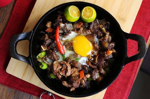 Spicy,And,Sizzling,Pork,Sisig,Is,A,Favorite,For,Filipinos