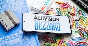 In this photo illustration an Activision Blizzard logo seen