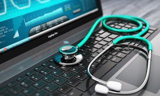 Creative abstract healthcare, medicine and cardiology tool concept: laptop or notebook computer PC with medical cardiologic diagnostic test software on screen and stethoscope on black wooden business 