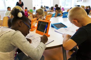 Students take notes from their iPads at the Steve Jobs school in Sneek