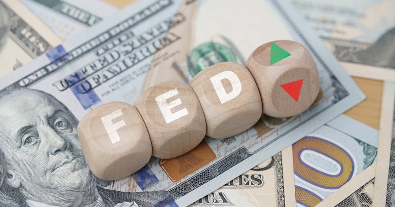 Fed,Wording,With,Up,And,Down,Arrow,On,Usd,Dollar