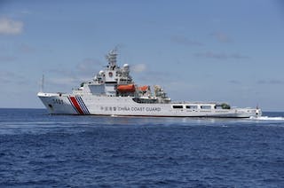 A Chinese Coast Guard vessel is pictured on the disputed Second Thomas Shoal, part of the Spratly Islands, in the South China Sea
