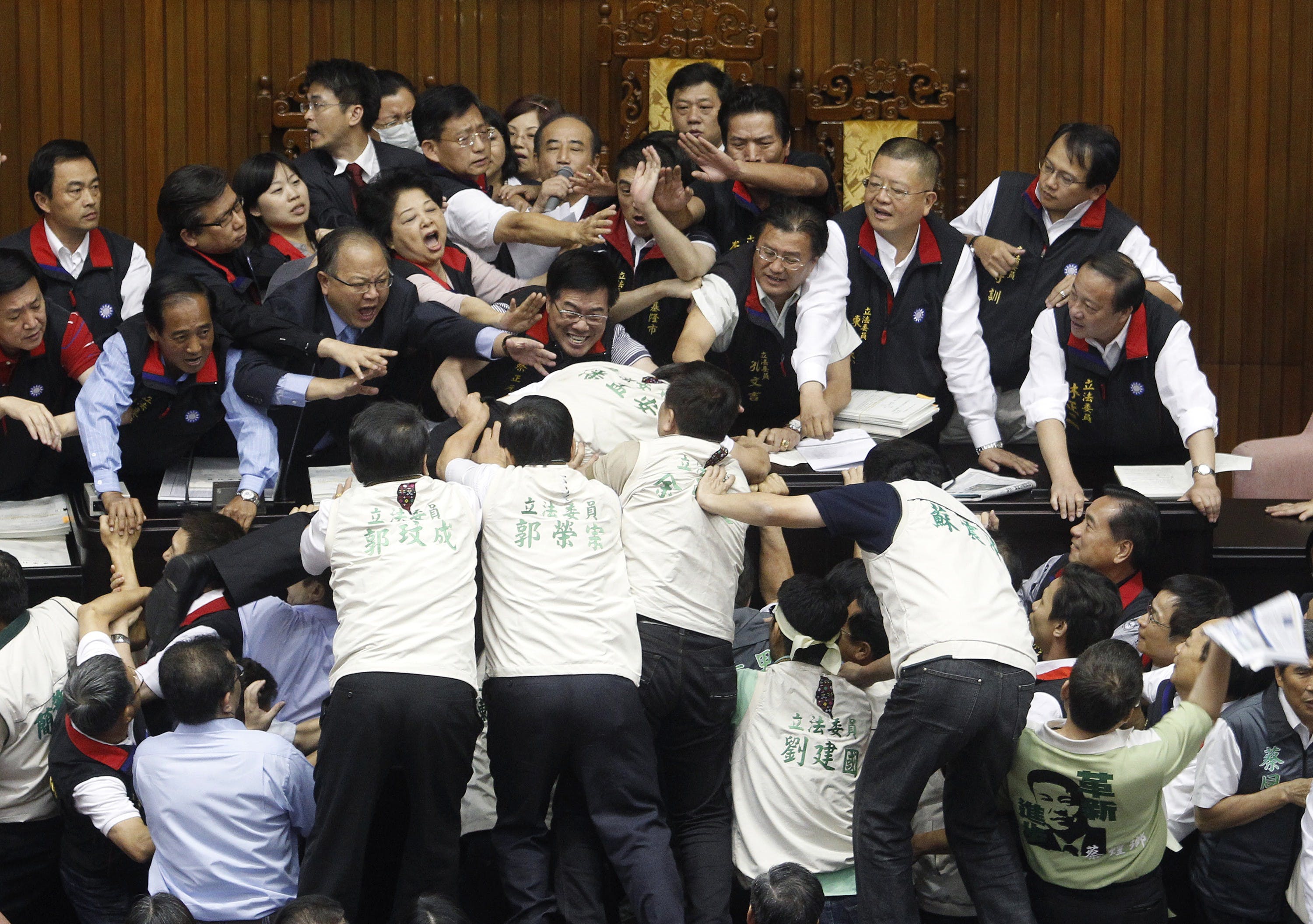 Opposition DPP legislators scuffle with ruling KMT legislators at the Legislative Yuan In Taiwan