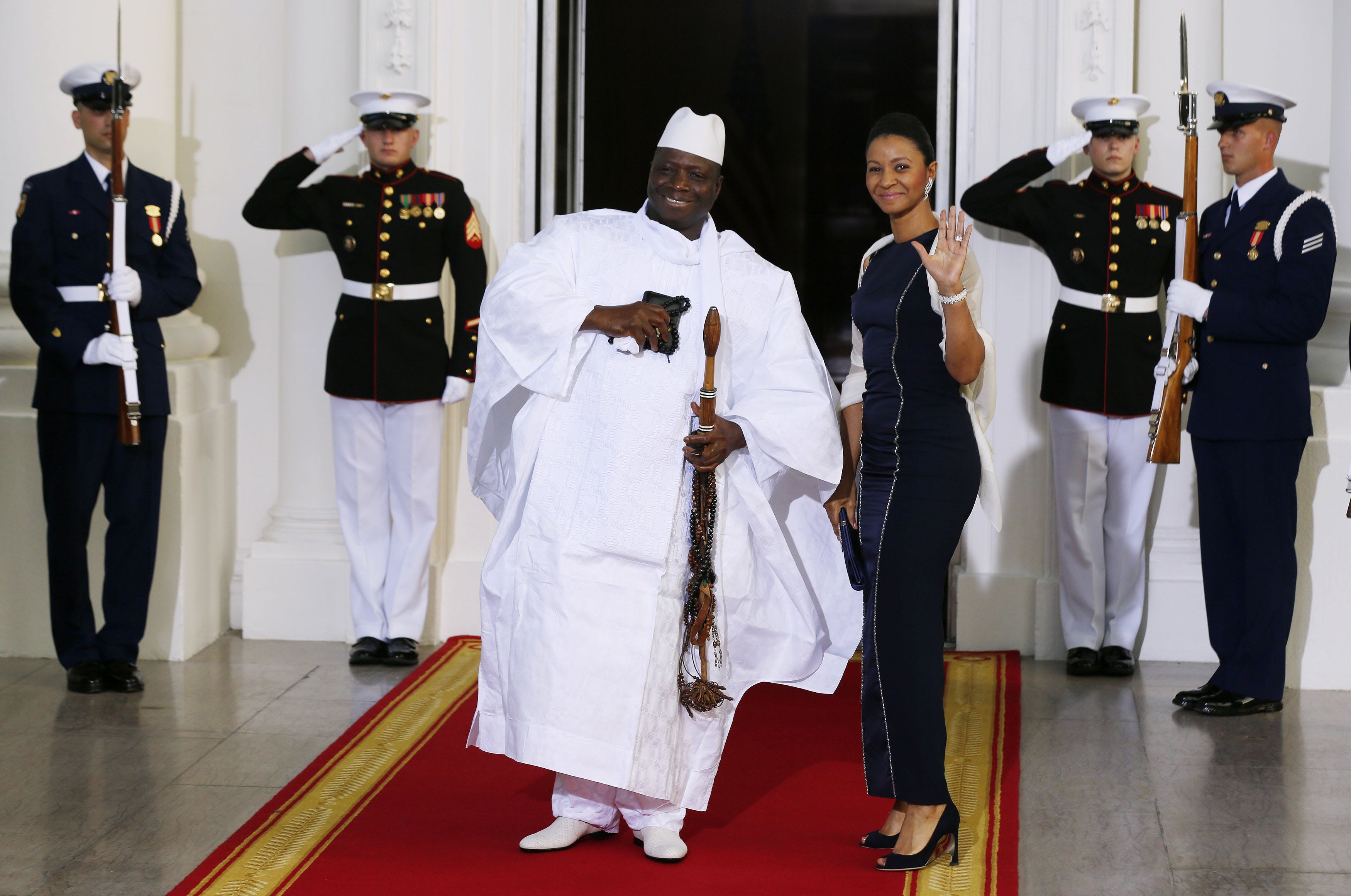 Republic of the Gambia's President Jammeh and his wife arrive for the official U.S.-Africa Leaders Summit dinner hosted by U.S. President Barack Obama at the White House in Washington