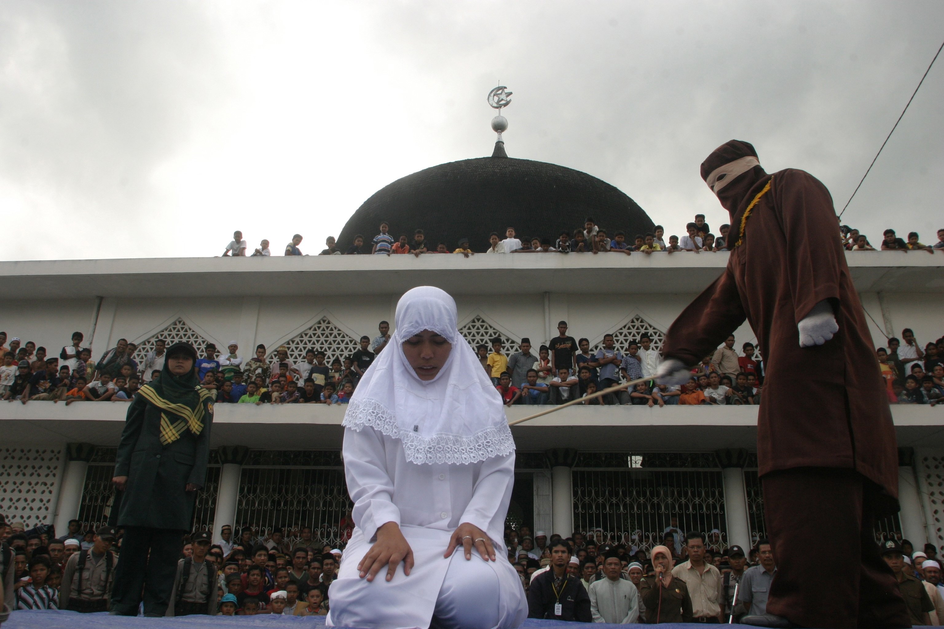 20-Year-Old Indonesian Girl Publicly Caned for Premarital Sex - The News  Lens International Edition