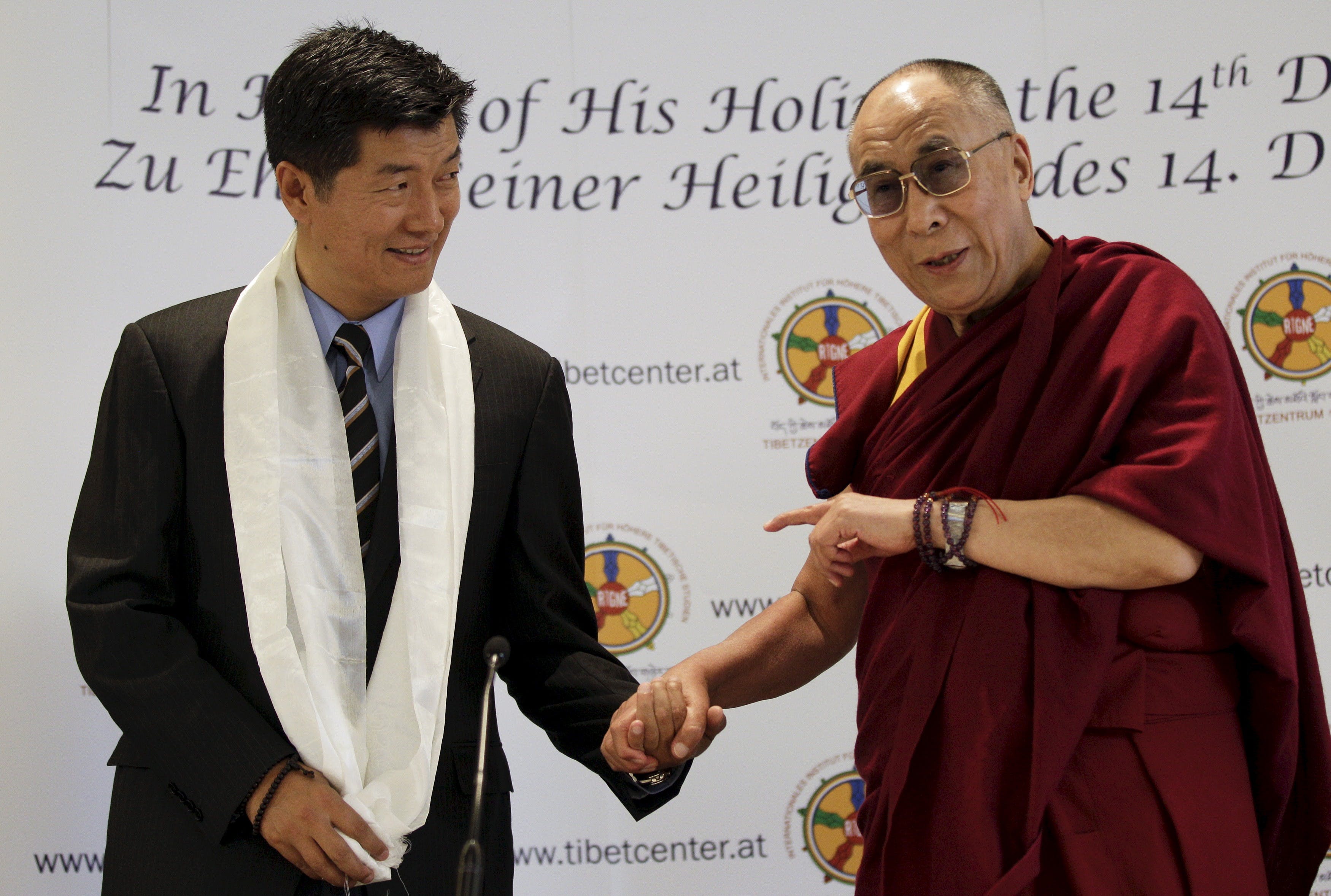 File photo of Tibet's exiled spiritual leader the Dalai Lama and Lobsang Sangay, Prime Minister of the Tibetan government-in-exile, arriving in Vienna