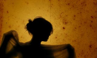 Girl with veil - A girl´s silhouette in yellow background
