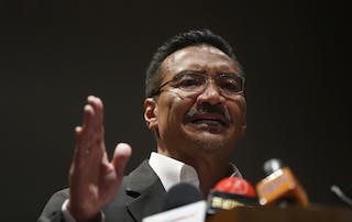 Malaysia's Defence Minister Hishammuddin Hussein speaks at a news conference about the investigation into the Malaysia Airlines Flight MH17 plane crash, on his return from Ukraine, in Kuala Lumpur