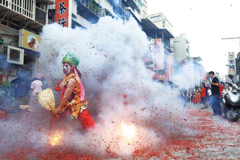 Temple parades are lively affairs and often feature performers in costume and huge firework displays. (Photo: Tourism Bureau)