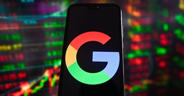POLAND - 2023/07/25: In this photo illustration a Google logo is displayed on a smartphone with stock market percentages in the background. (Photo Illustration by Omar Marques/SOPA Images/LightRocket via Getty Images)