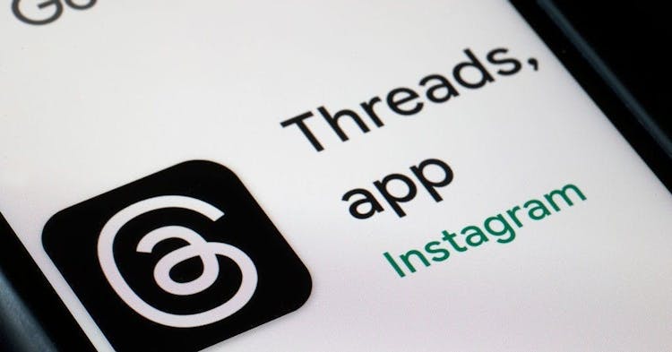 PARIS, FRANCE - JULY 05: In this photo illustration, the logo of the social media application Threads is displayed on the screen of an iPhone on July 05, 2023 in Paris, France. Mark Zuckerberg's company, Meta, the parent company of Instagram and Facebook, will officially launch Threads, Instagram's text-based conversation app, on July 6 to compete with Elon Musk's social network, Twitter.
(Photo illustration by Chesnot/Getty Images)