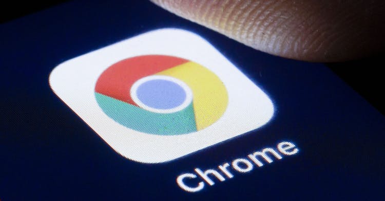 BERLIN, GERMANY - APRIL 22: The logo of the webbrowser Google Chrome is shown on the display of a smartphone on April 22, 2020 in Berlin, Germany. (Photo by Thomas Trutschel/Photothek via Getty Images)