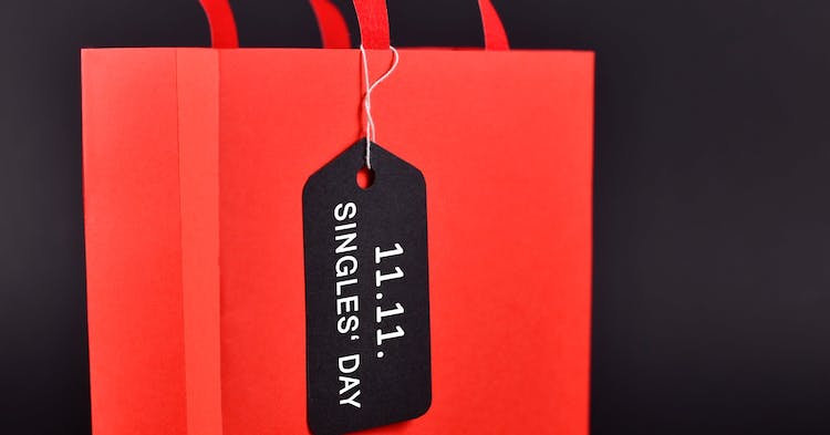 Shopping bag with tag saying '11.11. Singles' Day', a Chinese unofficial holiday and shopping season that celebrates people who are not in relationships